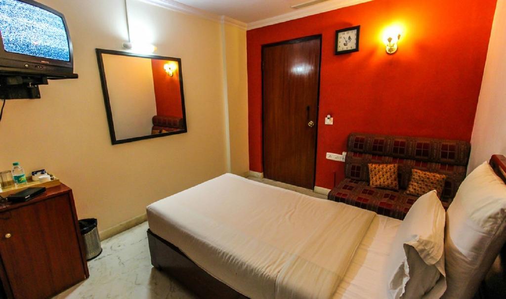 Hotel Pigeon International Bangalore Værelse billede