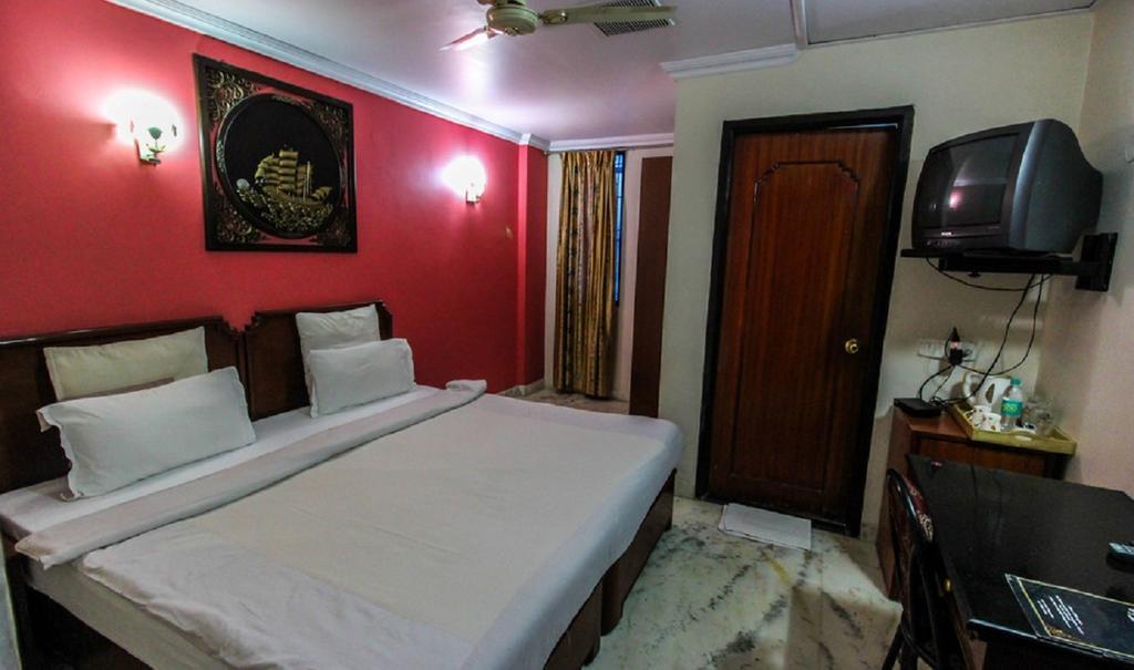 Hotel Pigeon International Bangalore Værelse billede