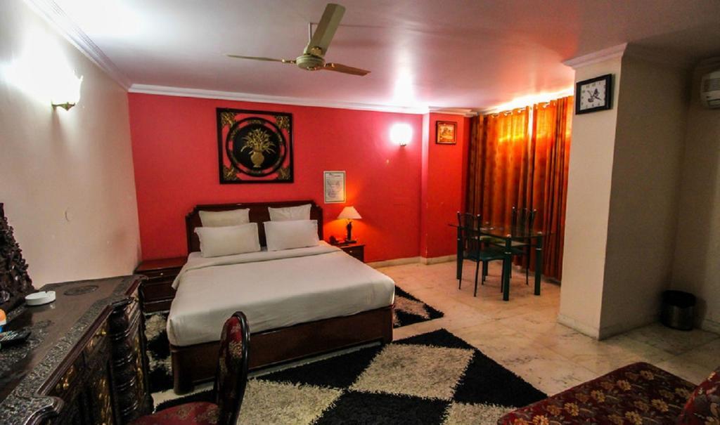Hotel Pigeon International Bangalore Værelse billede