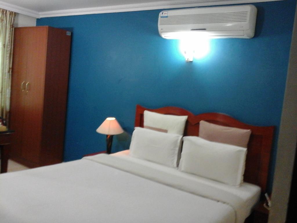 Hotel Pigeon International Bangalore Værelse billede
