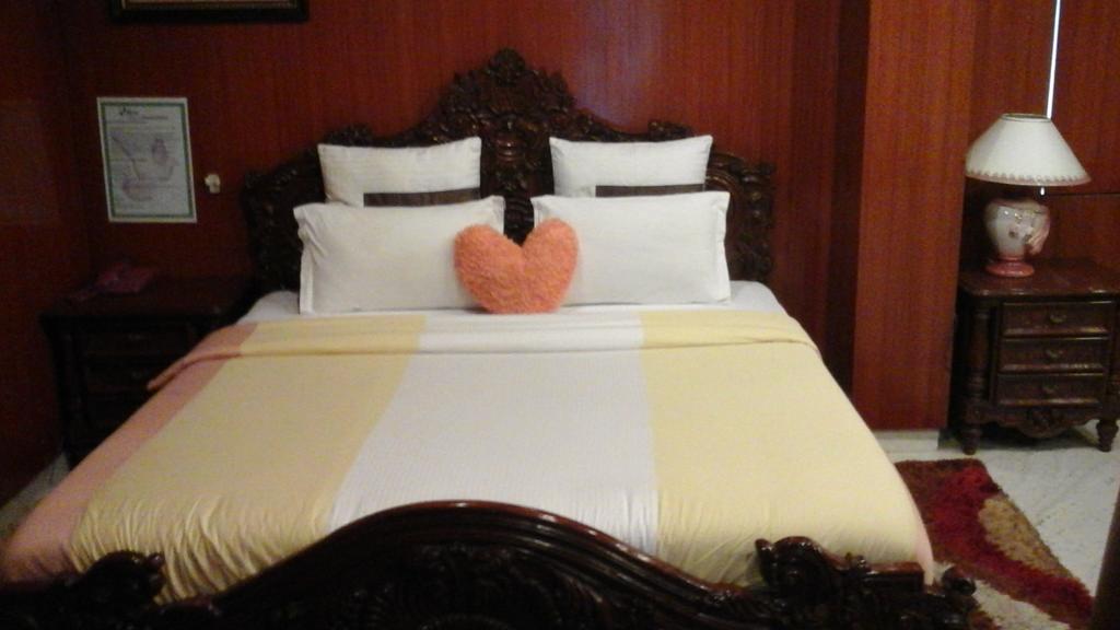 Hotel Pigeon International Bangalore Værelse billede